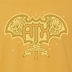 Detail of ATX Wings graphic screenprinted on front of mustard tee