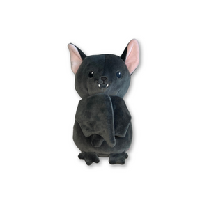 Black bat plushie with fabric features showing the wings closed