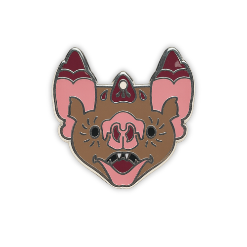 Stylized vampire bat head enamel pin on a white background