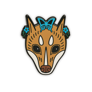 Stylized Mindoro Stripe-faced bat head enamel pin with butterfly on forehead on a white background