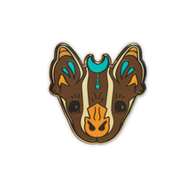 Stylized Tent-making bat head enamel pin on a white background
