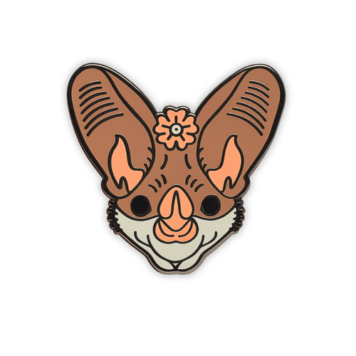 Stylized Ghost bat head enamel pin with forehead flower on a white background