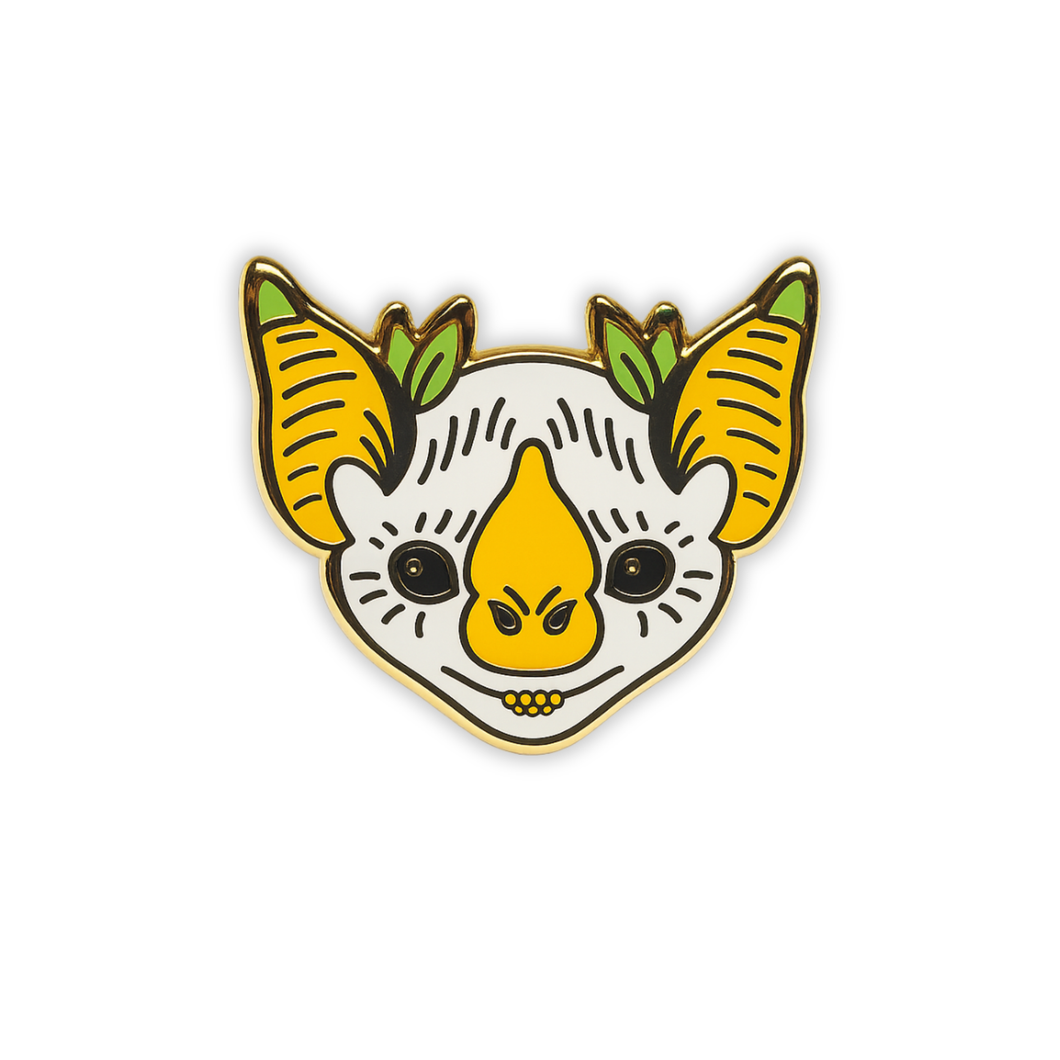 Stylized Honduran White bat head enamel pin on a white background