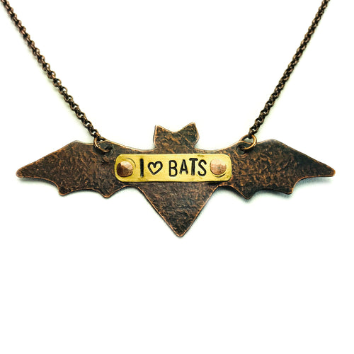 Hand cut antique copper bat necklace with I heart bats stamped on brass plate