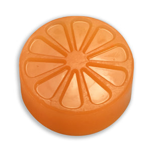 Orange candied citrus soap from a round mold