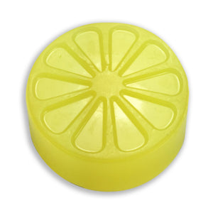 Yellow candied citrus soap from a round mold